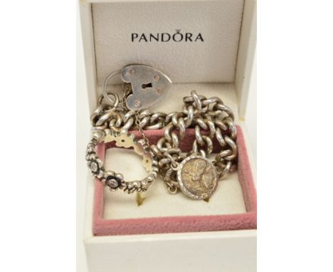 A CASED PANDORA RING AND A CURB LINK BRACELET, the ring designed as a row of vary sized flower heads, some set with colourles