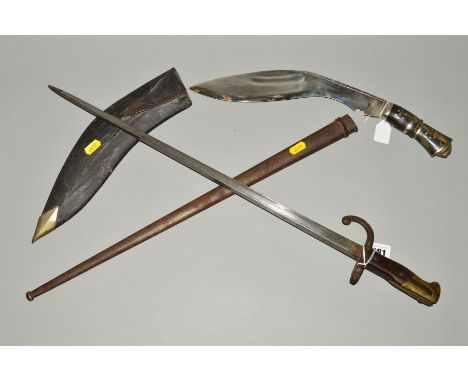 A FRENCH VICTORIAN 'GRAS' RIFLE BAYONET AND SCABBARD, blade has the usual St.Eteinne 1875 markings along the top edge, 65139 