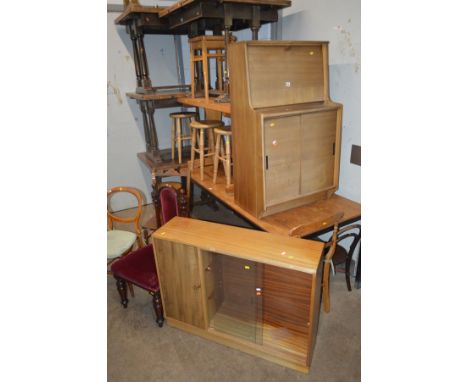 A MID 20TH CENTURY TEAK BUREAU together with a teak bookcase, a 1970's pine kitchen table, width 122cm x depth 70cm x height 