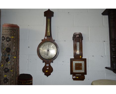AN EARLY 19TH CENTURY ROSEWOOD BANJO BAROMETER (losses), together with an oak aneroid barometer (2)