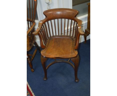 AN GEORGIAN AND LATER MAHOGANY AND WALNUT SMOKERS CHAIR, with a stick back, scrolled arms on cabriole legs united by a crinol