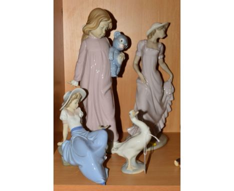 A LLADRO DUCK AND THREE NAO FIGURES, to include Girl with her Teddy Bear, height 31cm, a young woman holding her skirt dress 