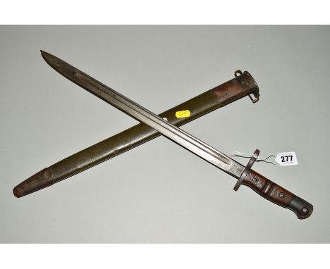 A WWI ERA 1913 PATTERN REMINGTON US ARMY RIFLE BAYONET AND SCABBARD, bayonet has the circular Remington stamp and other proof