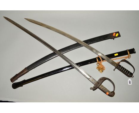 TWO MILITARY SWORDS, an Infantry Officer Sword, metal scabbard, ornate grip with crown/bugle design crest, blade is marked 'p