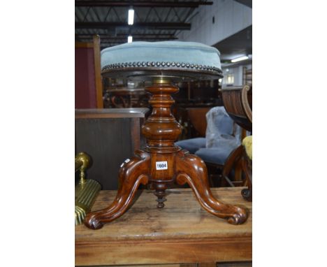 A VICTORIAN MAHOGANY SWIVEL TOP PIANO STOOL