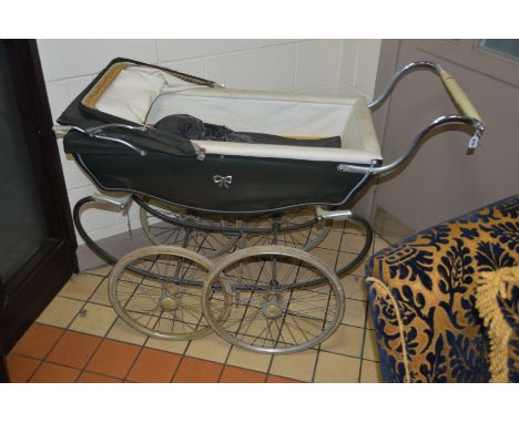 A VINTAGE SILVER CROSS PRAM
