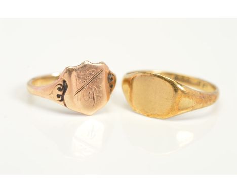 TWO SMALL SIGNET RINGS, the first a 9ct gold ring of plain design, with 9ct hallmark, ring size L, the second with shield sha
