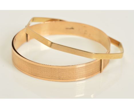 TWO 9CT GOLD BANGLES, the first of octagonal design with polished finish, the second of overlapping expandable design with an