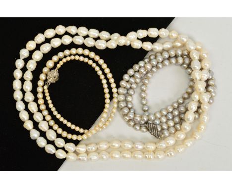 THREE CULTURED PEARL NECKLACES, the first a graduated row of spherical cultured pearls with a marcasite set clasp, the second