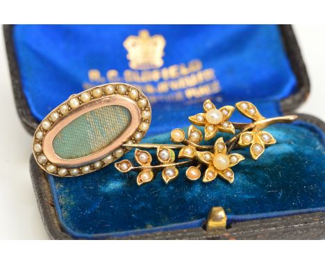 TWO LATE 19TH CENTURY TO EARLY 20TH CENTURY GOLD BROOCHES, the first an oval memorial brooch with vacant inner panel and spli