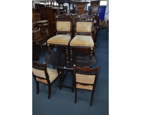 AN OAK BARLEY TWIST GATE LEG TABLE, width 90cm x length extended 120cm x height 73cm and a set of four Edwardian dining chair