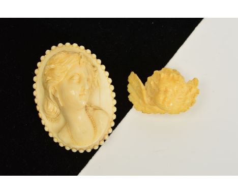 TWO LATE 19TH CENTURY CARVED IVORY BROOCHES, the first of oval outline carved in relief to depict a lady in profile, length 5