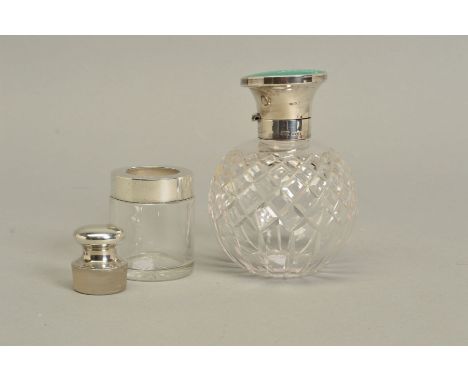 A GEORGE V GREEN ENAMEL AND SILVER TOPPED CUT GLASS SPHERICAL SCENT BOTTLE, London 1931, height 11.5cm, together with a Walke