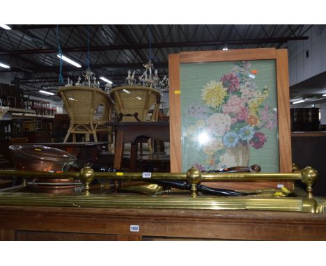 AN EARLY 20TH CENTURY BRASS FENDER, width 138cm together with a three piece companion set, two warming pans, oak firescreen e