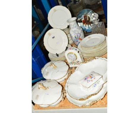 A QUANTITY OF FRENCH MONOGRAMMED WHITE CHINA DINNERWARES, having scroll borders with gilt edges, including two oval platters,