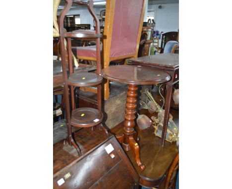 AN EDWARDIAN MAHOGANY THREE TIER FOLDING CAKE STAND together with a Victorian mahogany circular bobbin turned tripod table (2