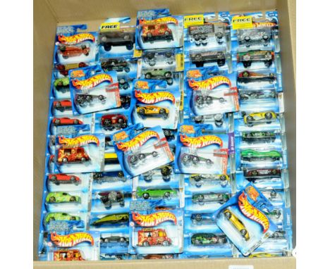 Mattel Hot Wheels - a group of short carded blisters to include mixed series ranging from early to mid 2000's which includes 