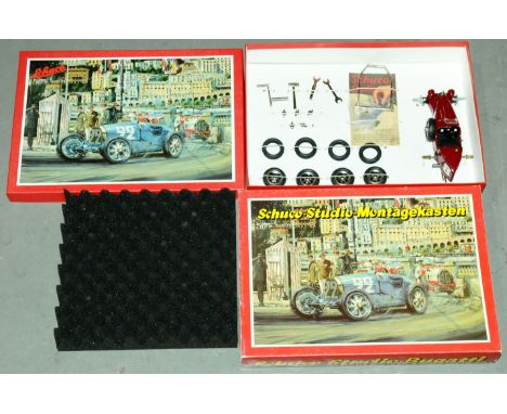 Schuco Studio Montagekasten - set contains a kit of parts to build a tinplate clockwork Bugatti Racing Car - Maroon with raci