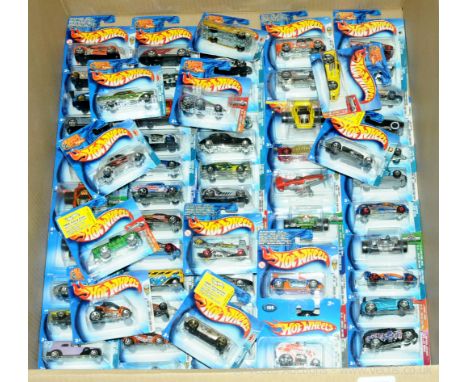 Mattel Hot Wheels - a group of short carded blisters to include mixed series ranging from early to mid 2000's which includes 