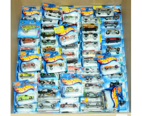 Mattel Hot Wheels - a group of short carded blisters to include mixed series ranging from early to mid 2000's which includes 