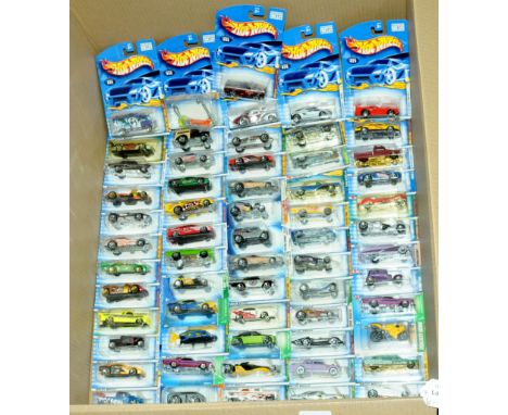 Mattel Hot Wheels - a group of long carded blisters to include mixed series ranging from early to mid 2000's which includes 2