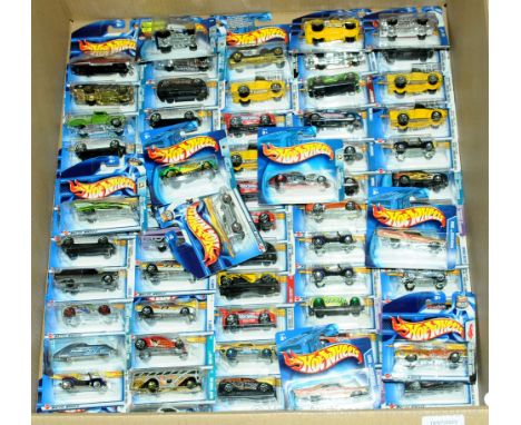 Mattel Hot Wheels - a group of short carded blisters to include mixed series ranging from early to mid 2000's which includes 