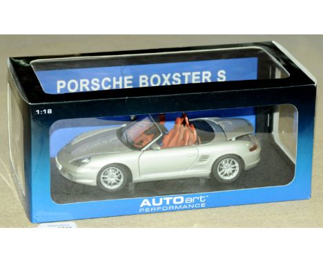 Autoart- a boxed 1:18 Scale Porsche Boxster S. Condition is Excellent to Near Mint in Good Plus to Excellent box. (1)