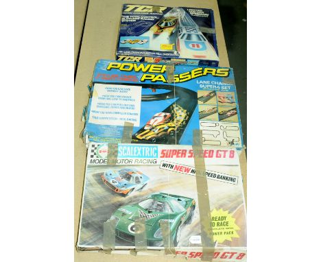 Scalextric, Palitoy &amp; Similar - a boxed group of Slot Cars to include Scalextric Super Speed GT 8 and others (see photo).