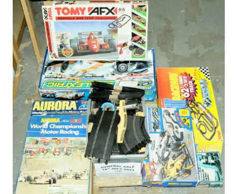 Mattel Hot Wheels (Racing), Hornby Scalextric, Tomy AFX and Aurora. A group of boxed Slot Racing Sets to include Mattel (Hot 