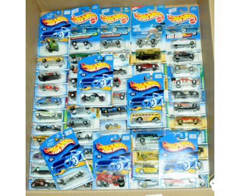 Mattel Hot Wheels - a group of long carded blisters to include mixed series ranging from early to mid 2000's which includes 2