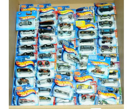 Mattel Hot Wheels - a group of short carded blisters to include mixed series ranging from early to mid 2000's which includes 