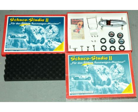 Schuco Studio II Auto Union Racing Car Kit "Rennwagen-Moneur" - box contains an unbuilt tinplate clockwork model in silver, w