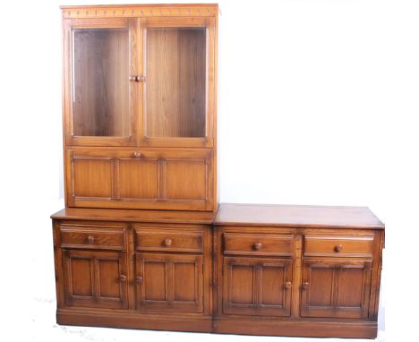 An pair of Ercol side cabinets, one with glazed cupboard upper sectionw.98cm h.196cm 