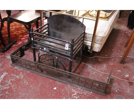 A steel fender 142cm length, iron grate and a pair of andirons 