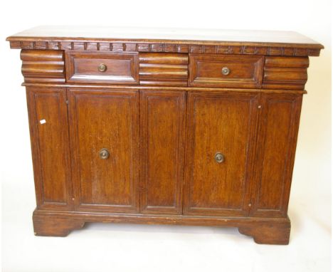 A Louis XV style walnut commode with short drawers and cupboards below 108cm high, 147cm wide 