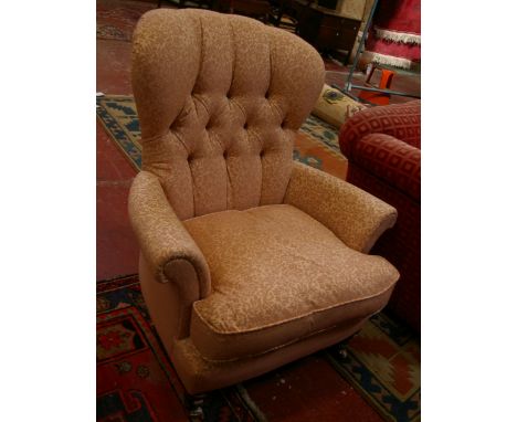 A Victorian style button upholstered armchair, together with a slat top coffee/lamp table