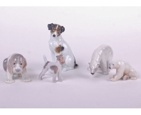 Five ceramic models of animals including a Lladro seated hound puppy, a Copenhagen polar bear and a smaller one by Bing & Gro