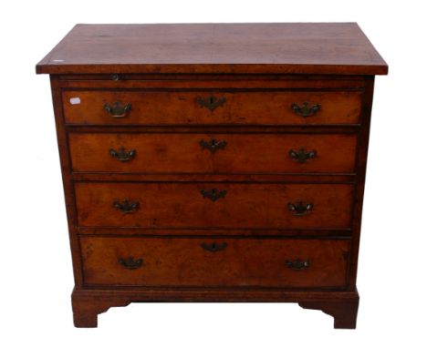 An 18th century walnut bachelors chest, brushing slide four long drawers, bracket feet 83 cm high 90 cm wide