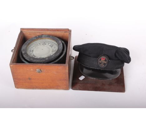 A ships compass J. D Lang & Co, Glasgow held in mahogany box, together with a Moss Bros naval hat