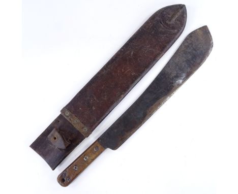 A Second World War Period machete by Kitchin Ltd of Sheffield, dated 1943, leather scabbard, blade length 38cmAge and use rel