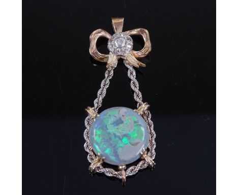 A handmade unmarked gold cabochon black opal and diamond cluster pendant, 5.9ct opal suspended from a white gold rope twist c