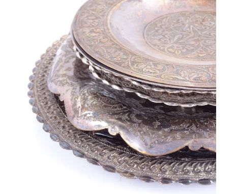 A group of various unmarked white metal plates and trays, largest diameter 19.5cm, 18.6oz total (6)Generally good original co