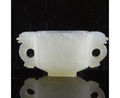 A Chinese pale celadon jade 2-handled Gui cup, dragon decorated handles, 8cm across, 38mmPerfect condition, no chips or crack