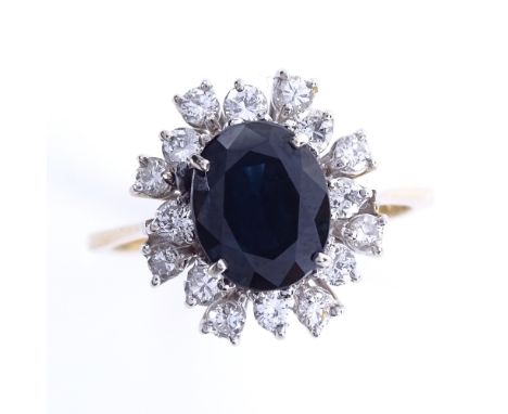 A late 20th century 18ct gold sapphire and diamond cluster snowflake ring, total diamond content approx 0.32ct, hallmarks Lon