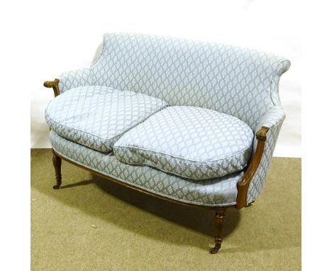 A small Edwardian upholstered parlour sofa with carved show-wood arms, width 125cm Height to the seat excluding cushions is 3