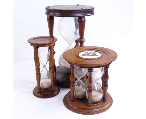 3 wood-framed hour glasses, largest height 24cm, modernOne china panel cracked on 3 glass timer, with chip to wood side colum