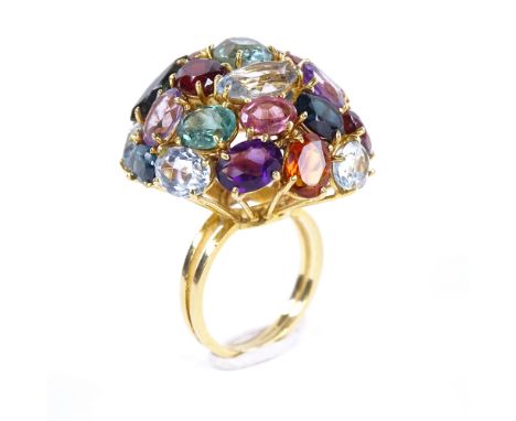 A large gem-set bombe ring, circa 1980s, gemstones include amethyst, garnet, citrine, aquamarine etc, in 18ct gold settings w