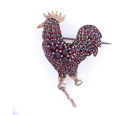A Victorian unmarked yellow metal faceted garnet cockerel brooch, brooch height 35.8mm, 6.8gGood original condition, only two