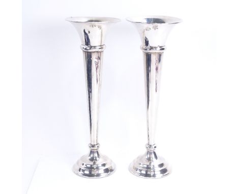 A pair of George V silver spill vases, tapered cylindrical form with fluted rims, by J & R Griffin, hallmarks Chester 1916, h