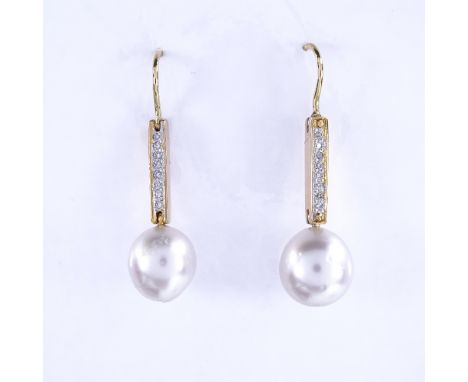 A pair of unmarked gold cultured pearl and diamond drop earrings, earring height excluding fitting 25.1mm, 4.5gExcellent orig